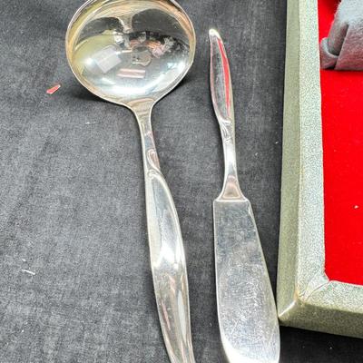 Sale Photo Thumbnail #461: Set for 12 ( 8 knives) with serving pieces in original tarnish proof box with COA. Lovely simple pattern Silver plate Service/6+  50's Mid-Century Modern ROGERS International Flatware SWEEP Pattern SWIRL in Handle w/Leaf Good Condition No Wear