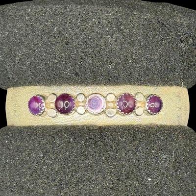 Sale Photo Thumbnail #101: [29.52g] This beautiful piece features amethyst cabochons in a satin sterling silver setting. Measurement: 2.25”W. Silver content confirmed using Niton XRF precious metals analyzer. [JP]