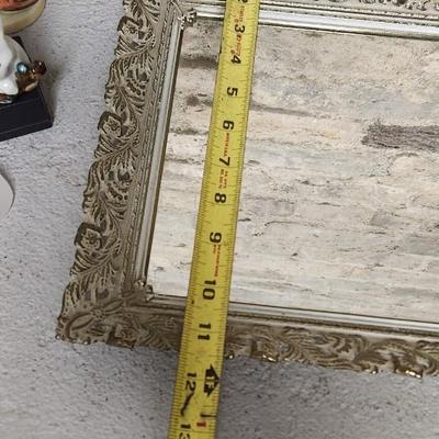 Sale Photo Thumbnail #144: Mirrored dresser tray with a pewter porringer, Hummel Girl with Geese, sleeping kitty, Bing and Grondahl thimble and a Zsolnay Bunny figurine