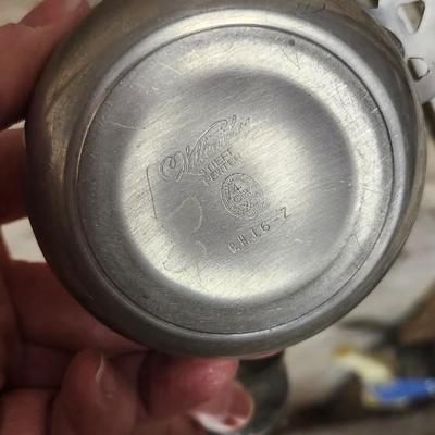 Sale Photo Thumbnail #143: Mirrored dresser tray with a pewter porringer, Hummel Girl with Geese, sleeping kitty, Bing and Grondahl thimble and a Zsolnay Bunny figurine