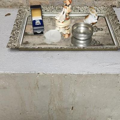 Sale Photo Thumbnail #130: Mirrored dresser tray with a pewter porringer, Hummel Girl with Geese, sleeping kitty, Bing and Grondahl thimble and a Zsolnay Bunny figurine