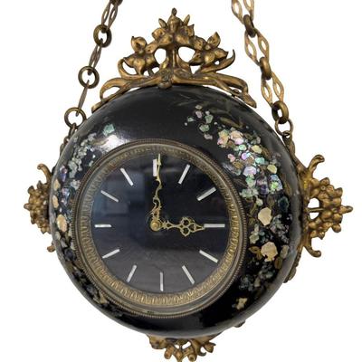 Sale Photo Thumbnail #125: Made in France, this Napoleon III era piece has a black lacquered finish with mother of pearl inlay, and brass accents. It includes a hanging chain. It has not been tested. Two screws are missing, but the piece is still sturdy. Measurement: 13.5” Diamet