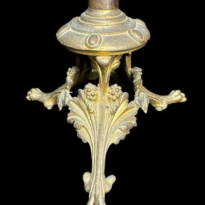 Sale Photo Thumbnail #135: These lacquered tables have mother of pearl flying cranes and clouds. The pedestals are constructed of brass and lacquered wood. There is some paint loss on the edges, and one base is not straight, and may have been bent at one time. Measurement: 16.5”H