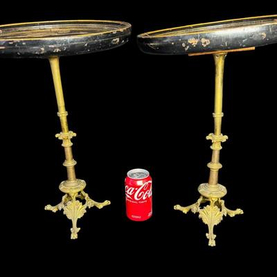 Sale Photo Thumbnail #132: These lacquered tables have mother of pearl flying cranes and clouds. The pedestals are constructed of brass and lacquered wood. There is some paint loss on the edges, and one base is not straight, and may have been bent at one time. Measurement: 16.5”H