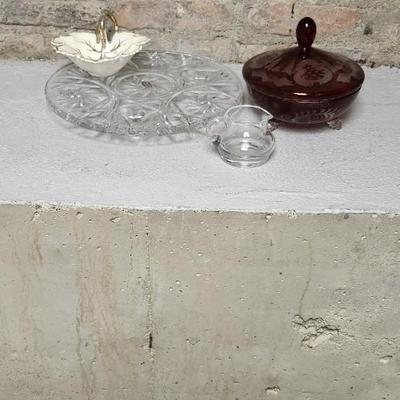 Sale Photo Thumbnail #192: Crystal cake plate, beautiful little blown creamer, vintage leaf bowl and a fantastic Egermann etched candy dish in cranberry