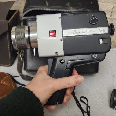Sale Photo Thumbnail #208: Pair of old video cameras, Colt 84 and a gaf Anscomatic st/90 as well as a few old accessories