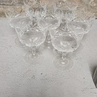 Sale Photo Thumbnail #258: Lariat Etched Platter, Etched Cake plate, crystal sherbets, 2 berry sets, a cracked crystal basket, Avon Glass egg, etc etc