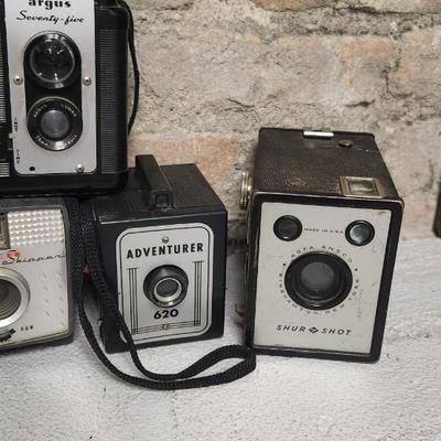 Sale Photo Thumbnail #330: Lots of box cameras Birdseye, Ansco Sure Shot - 3 different ones, Spartus, Adventurer, Tower Skipper, and a couple Arogflex 75
