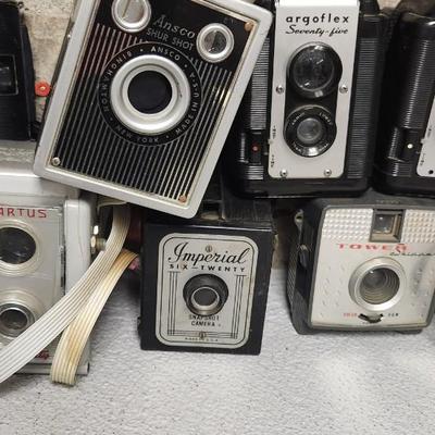 Sale Photo Thumbnail #328: Lots of box cameras Birdseye, Ansco Sure Shot - 3 different ones, Spartus, Adventurer, Tower Skipper, and a couple Arogflex 75