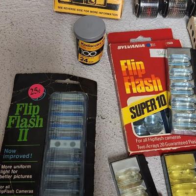 Sale Photo Thumbnail #345: Misc lot of flash bulbs and some film