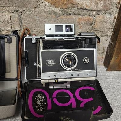 Sale Photo Thumbnail #382: Polaroid cameras 103, 104, 220 and 360