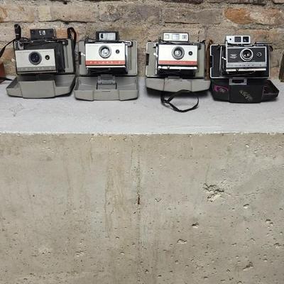 Sale Photo Thumbnail #378: Polaroid cameras 103, 104, 220 and 360