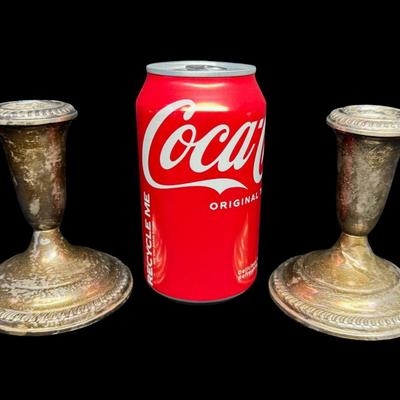 Sale Photo Thumbnail #195: [559g] These Empire candlesticks are weighted, and have tarnish throughout. Measurement: 4.25”H x 3.5”W (each). [JP]