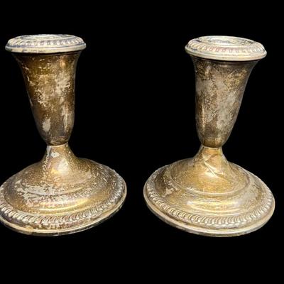 Sale Photo Thumbnail #194: [559g] These Empire candlesticks are weighted, and have tarnish throughout. Measurement: 4.25”H x 3.5”W (each). [JP]