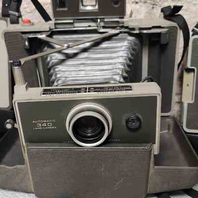 Sale Photo Thumbnail #394: 4 Polaroids Models 104. 220, 340 and 440