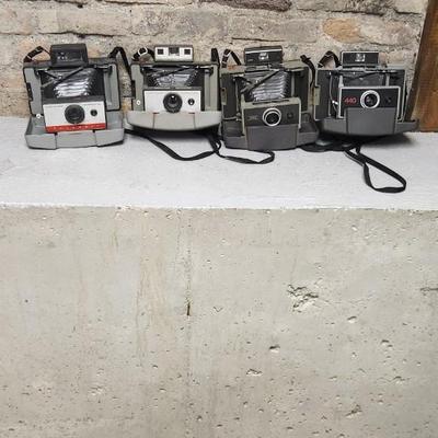 Sale Photo Thumbnail #391: 4 Polaroids Models 104. 220, 340 and 440