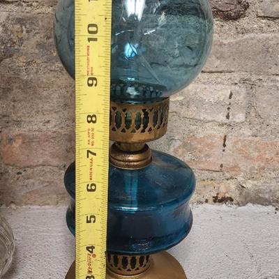 Sale Photo Thumbnail #456: Thumbprint and Bar oil lamp and a spectacular turquoise Glass Lamp