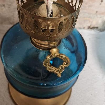 Sale Photo Thumbnail #457: Thumbprint and Bar oil lamp and a spectacular turquoise Glass Lamp