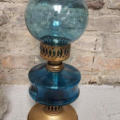 Sale Photo Thumbnail #455: Thumbprint and Bar oil lamp and a spectacular turquoise Glass Lamp