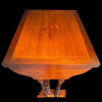 Sale Photo Thumbnail #249: These Revival design tables have distinctive faux bamboo legs, and feature a starburst of diamond shaped veneer inlay on the surface. Total of three pieces. Measurement of largest: 28”H x 17”W. [JP]