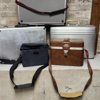 Sale Photo Thumbnail #492: 5 camera Cases, blue soft side, brown leather vintage and 3 metal cases
