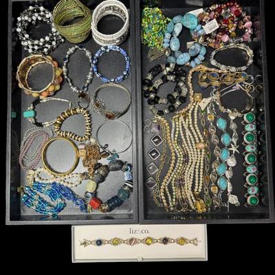 Sale Photo Thumbnail #253: Includes gold tone, silver tone, beads, stones, and more. Styles include bangle, tennis bracelet, cuff, and more. Total of 40+ pieces. Does not include display trays. [JP]