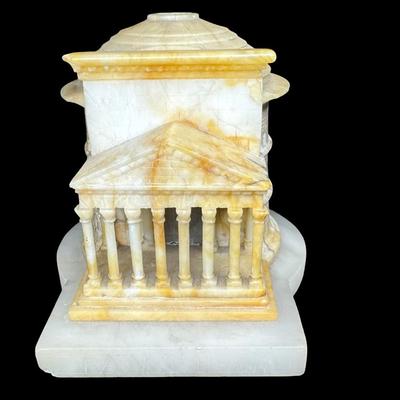 Sale Photo Thumbnail #263: This piece was most likely purchased as a keepsake of the “Grand Tour” in Europe in the late 19th century, while visiting Rome. It is made entirely of alabaster. There is minor chipping or flea bites along the dome. Measurement: 5”W x 4”H. [JP]