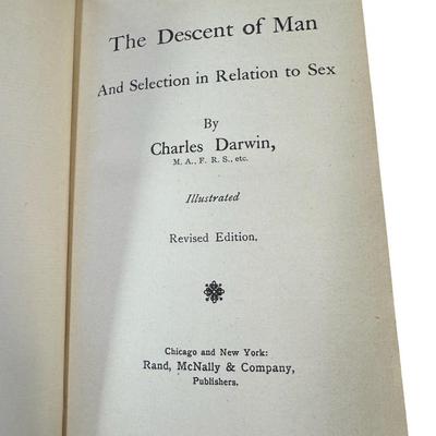 Sale Photo Thumbnail #270: Both of these texts are from the late 1900s. “Origin of a Species” is the University Edition, and “Descent of Man” is a Second Edition. Both books have age related wear. The bindings on both are intact. There is some discoloration and pencil writi