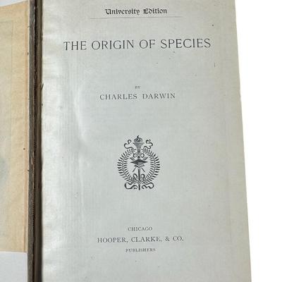 Sale Photo Thumbnail #271: Both of these texts are from the late 1900s. “Origin of a Species” is the University Edition, and “Descent of Man” is a Second Edition. Both books have age related wear. The bindings on both are intact. There is some discoloration and pencil writi
