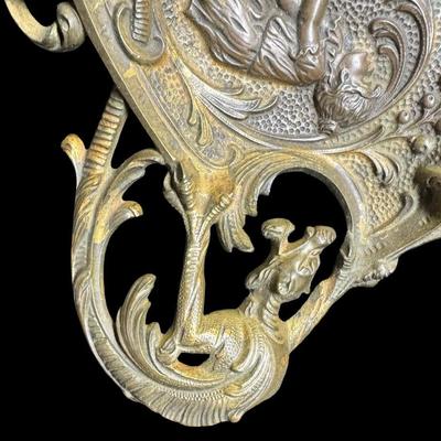 Sale Photo Thumbnail #276: Includes a European mixed metal ashtray, and a brass Danish ashtray with high relief. Age related wear, including patina. Measurement of largest: 7.25”L. Pre-auction estimate: $75-$150. [JP]