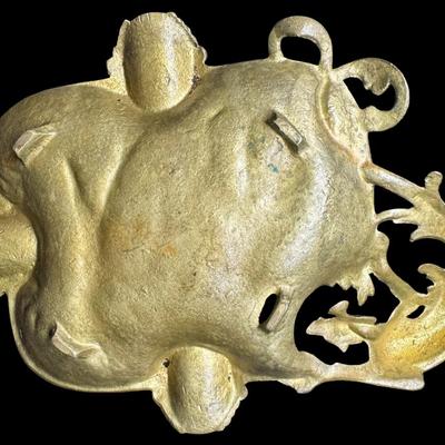 Sale Photo Thumbnail #277: Includes a European mixed metal ashtray, and a brass Danish ashtray with high relief. Age related wear, including patina. Measurement of largest: 7.25”L. Pre-auction estimate: $75-$150. [JP]