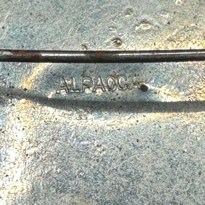 Sale Photo Thumbnail #284: Includes two “Alpacca” brooches, and one vintage brooch with a tested 800 silver filigree border. The vintage piece is missing the pin, and has age related wear. The mosaic on all three pieces appears to be intact. Measurement of largest: 2”W. Silve