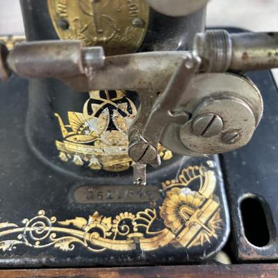 Singer Sewing Machine in Cabinet