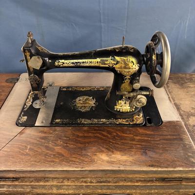 Singer Sewing Machine in Cabinet