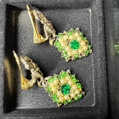 Sale Photo Thumbnail #297: Includes 25 pairs of earrings, and two single earrings. Some are vintage. There are clip-on earrings, as well as pierced earrings. Does not include display tray. [JP]