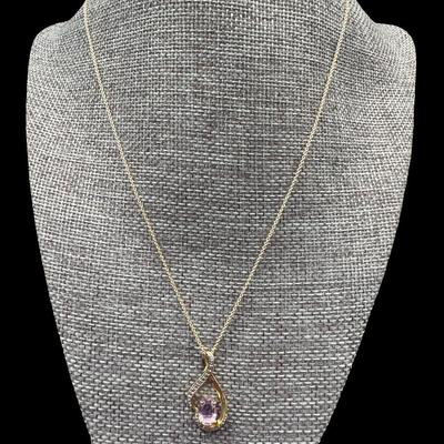 Sale Photo Thumbnail #322: [3.77g] This features an amethyst and diamond accent infinity pendant, on a classic cable chain. Both pieces have a gold vermeil wash. Length of chain: 18”L. [JP]