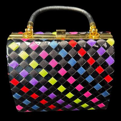 Sale Photo Thumbnail #325: Includes Nine West, Coach, Braciano, and more. Total of four pieces. Styles include wristlet, clutch, and more. There is age related wear, with no signs of serious damage or staining. Pre-auction estimate: $50-$100. [JP]