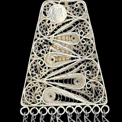 Sale Photo Thumbnail #335: [26.25g] This piece is marked “Israel, 925.” It features stunning filigree work, and has a green stone cabochon. There is a gold vermeil wash on this pendant. Measurement: 3.25”H x 2”W. [JP]