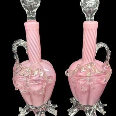 Sale Photo Thumbnail #347: These decanters have a swirl, or “Guttate” pattern. The stoppers are original. There are some chips on the fingers on the base of each; however, there are no significant cracks or damage to the stoppers. Measurement: 9”H (each). Pre-auction estimate
