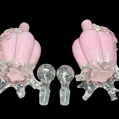 Sale Photo Thumbnail #346: These decanters have a swirl, or “Guttate” pattern. The stoppers are original. There are some chips on the fingers on the base of each; however, there are no significant cracks or damage to the stoppers. Measurement: 9”H (each). Pre-auction estimate