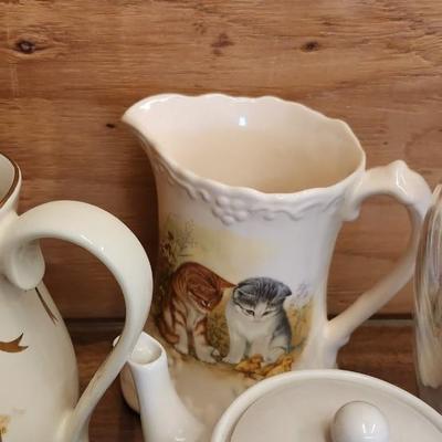 Sale Photo Thumbnail #567: Large lot of pitchers etc...some are chippy