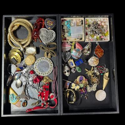 Sale Photo Thumbnail #373: Includes pendants, brooches, trinket boxes, a metal mesh snake belt, watches (not tested), souvenir spoons, and more. Total of 50+ pieces. Does not include display trays. [JP]