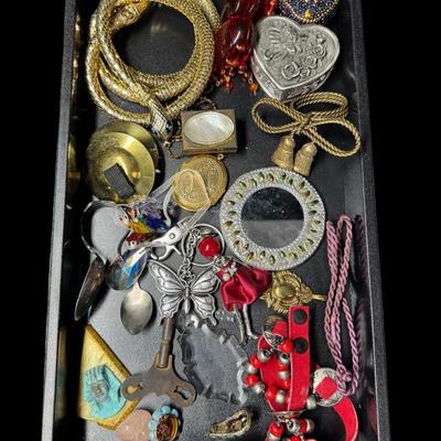 Sale Photo Thumbnail #375: Includes pendants, brooches, trinket boxes, a metal mesh snake belt, watches (not tested), souvenir spoons, and more. Total of 50+ pieces. Does not include display trays. [JP]