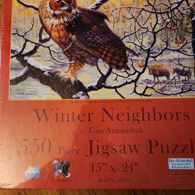 Sale Photo Thumbnail #182: This lot is for Two New Puzzles.  One shows The Great Smoky Mountain Wheel and has a finished size of about 18X24-inches with 500 pieces.   The other is titled Winter Neighbors and shows wildlife, with a finished size of about 15X24-inches with 550 pieces