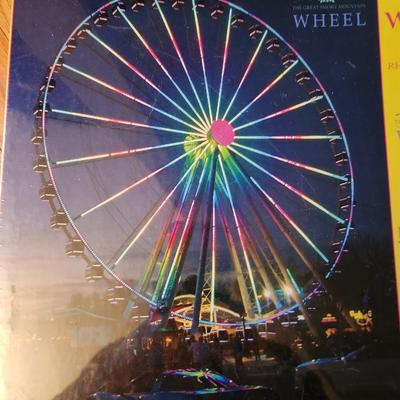 Sale Photo Thumbnail #183: This lot is for Two New Puzzles.  One shows The Great Smoky Mountain Wheel and has a finished size of about 18X24-inches with 500 pieces.   The other is titled Winter Neighbors and shows wildlife, with a finished size of about 15X24-inches with 550 pieces