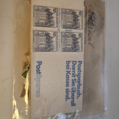 Sale Photo Thumbnail #197: This lot is for a Bag of Vintage German Stamps.  This bag has many hundred old German stamps of various values.  Most have cancellation marks but some have not been use.  Great collection with so many uses.