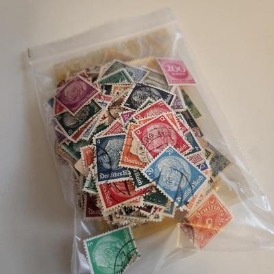 Sale Photo Thumbnail #193: This lot is for a Bag of Vintage German Stamps.  This bag has many hundred old German stamps of various values.  Most have cancellation marks but some have not been use.  Great collection with so many uses.