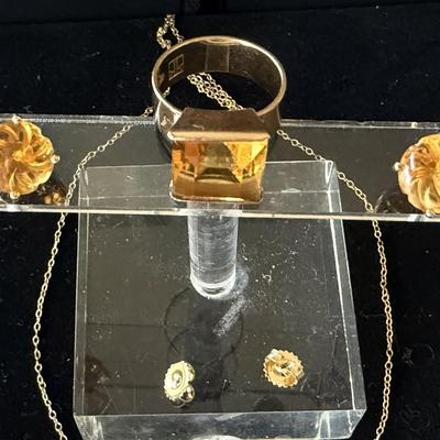 Sale Photo Thumbnail #5: Pierced earrings, 14 K gold, tested and marked 
Ring, size 6, yellow orange citrine stone, marked 585 UJK
Pendant on chain cushion cut citrine, 18 inch chain
Very beautiful stones on this set, November birthstone
Very nice condition.