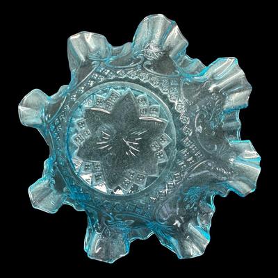 Sale Photo Thumbnail #408: Includes a Fenton water lily and cattails bowl, and a blue ruffled candy dish. Total of two pieces. Measurement of largest: 8”W. [JP]