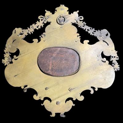 Sale Photo Thumbnail #409: Includes a dore’ tazza, and a brass European wall plaque with sterling silver insert. The wall plaque outside of the silver medallion in the center tests 70% silver, but has a brass appearance. Both pieces have age related wear. Measurement of largest: 